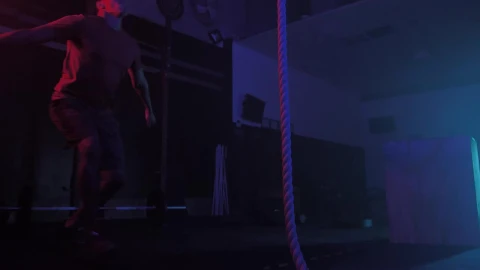 Stock Video Crossfit Man While Training Climbing A Rope Live Wallpaper For PC - Free Live Wallpaper