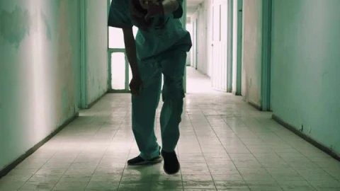 Stock Video Creepy Zombie Male Nurse Approaching Down A Hallway Live Wallpaper For PC - Free Live Wallpaper