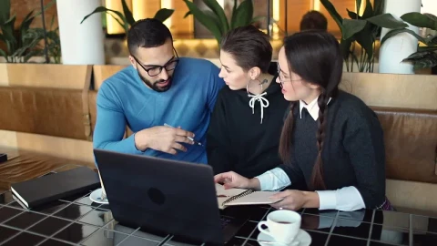 Stock Video Creative Team Researching Project In Cafe Live Wallpaper For PC - Free Live Wallpaper