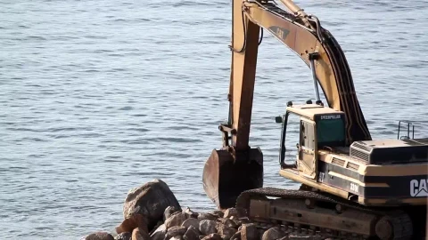 Stock Video Crane Digging On Rocks At The Sea Live Wallpaper For PC - Free Live Wallpaper