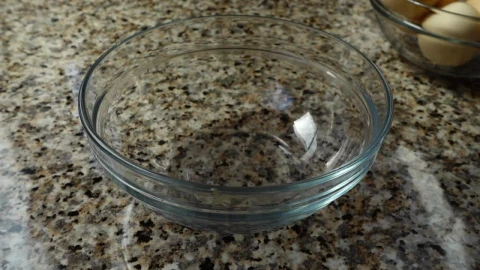 Stock Video Cracking A Raw Egg Into A Glass Bowl Live Wallpaper For PC - Free Live Wallpaper
