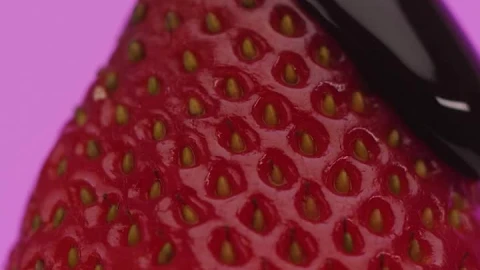 Stock Video Covering A Strawberry With Liquid Chocolate On A Lilac Background Live Wallpaper For PC - Free Live Wallpaper