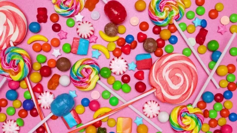 Stock Video Covering A Pink Background With Candies In Stop Motion Live Wallpaper For PC - Free Live Wallpaper