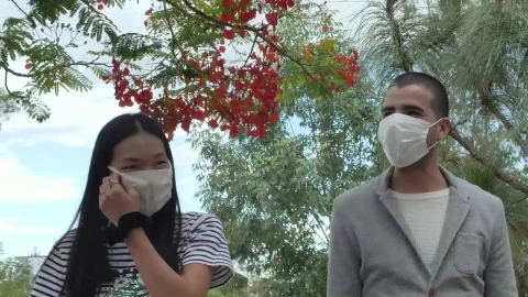 Stock Video Couple With Masks Walking In A Park Live Wallpaper For PC - Free Live Wallpaper