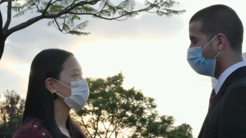 Stock Video Couple Wearing Face Masks Under A Beautiful Sunset Live Wallpaper For PC - Free Live Wallpaper
