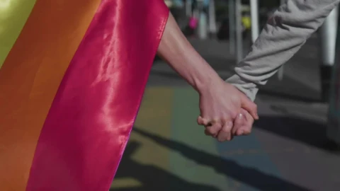 Stock Video Couple Walking In The Street With A Rainbow Flag Live Wallpaper For PC - Free Live Wallpaper