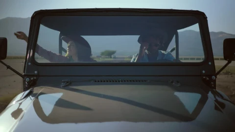Stock Video Couple Traveling Down A Road In A Jeep Live Wallpaper For PC - Free Live Wallpaper