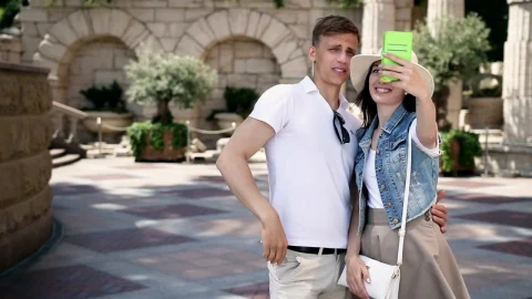 Stock Video Couple Taking Selfies During A Walk Live Wallpaper For PC - Free Live Wallpaper