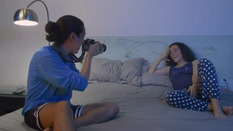 Stock Video Couple Taking Pictures On Bed Live Wallpaper For PC - Free Live Wallpaper