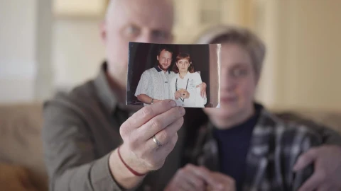 Stock Video Couple Showing An Old Photograph Of Them Live Wallpaper For PC - Free Live Wallpaper