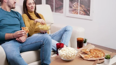 Stock Video Couple Sharing A Pizza And Popcorn Live Wallpaper For PC - Free Live Wallpaper