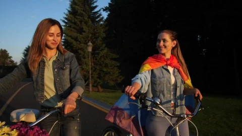 Stock Video Couple Pushing Bikes With Flowers Live Wallpaper For PC - Free Live Wallpaper