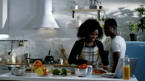 Stock Video Couple Preparing Food Following A Tutorial Live Wallpaper For PC - Free Live Wallpaper