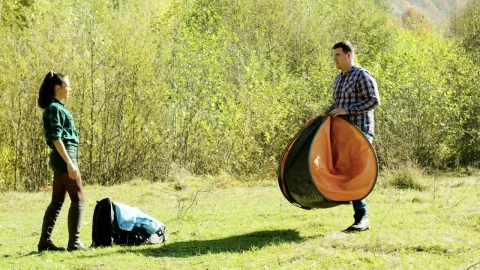 Stock Video Couple Preparing A Tent For The Night Live Wallpaper For PC - Free Live Wallpaper