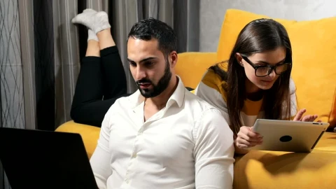 Stock Video Couple On Laptop And Tablet Work During Lockdown Live Wallpaper For PC - Free Live Wallpaper