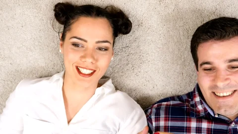 Stock Video Couple Lying On The Carpet Laughing And Talking Live Wallpaper For PC - Free Live Wallpaper
