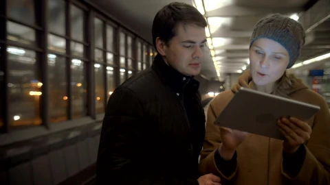 Stock Video Couple Looking For Directions On A Tablet Live Wallpaper For PC - Free Live Wallpaper
