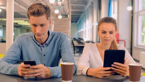 Stock Video Couple In A Cafe Connected On Their Devices Live Wallpaper For PC - Free Live Wallpaper