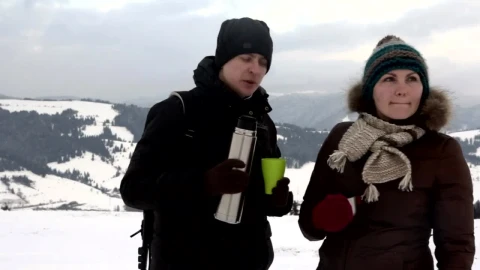 Stock Video Couple Having Tea In A Snowy Mountain Landscape Live Wallpaper For PC - Free Live Wallpaper