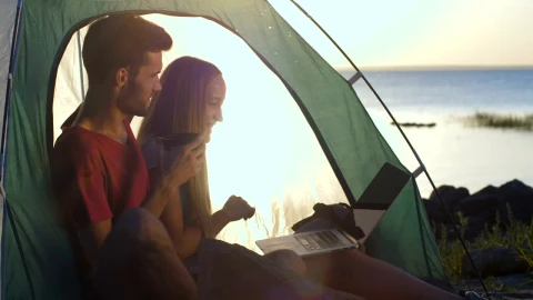Stock Video Couple Having A Video Call While Camping Live Wallpaper For PC - Free Live Wallpaper