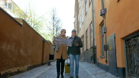 Stock Video Couple Following A Map Through Town Live Wallpaper For PC - Free Live Wallpaper