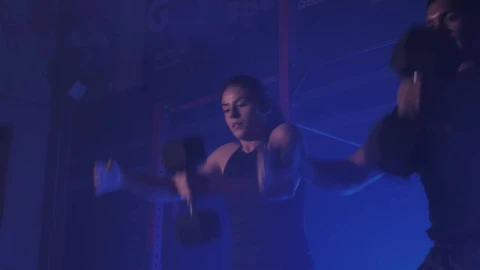 Stock Video Couple Exercising With Dumbbells In The Gym Live Wallpaper For PC - Free Live Wallpaper