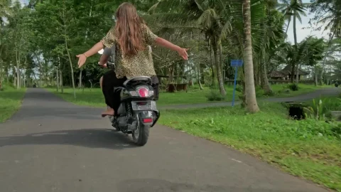 Stock Video Couple Enjoying A Scooter Ride On Their Vacation Live Wallpaper For PC - Free Live Wallpaper