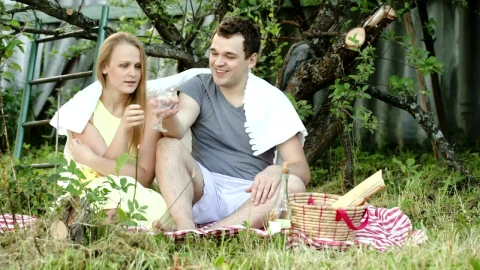 Stock Video Couple Enjoying A Picnic In Their Garden Live Wallpaper For PC - Free Live Wallpaper