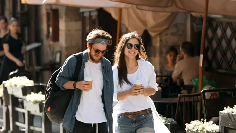 Stock Video Couple Enjoy Friendship While Walking On City Street Live Wallpaper For PC - Free Live Wallpaper