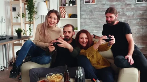 Stock Video Couple Enjoy Friendly Gaming Competition At Home Live Wallpaper For PC - Free Live Wallpaper