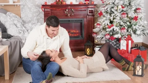 Stock Video Couple Enjoy Christmas Romance In Front Of Fireplace Live Wallpaper For PC - Free Live Wallpaper
