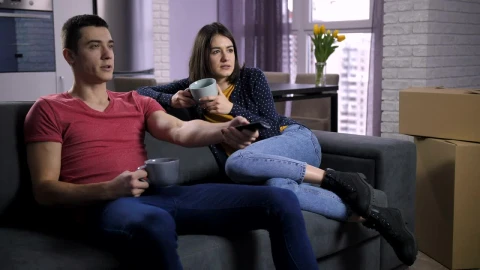Stock Video Couple Drinking Tea On The Sofa Live Wallpaper For PC - Free Live Wallpaper