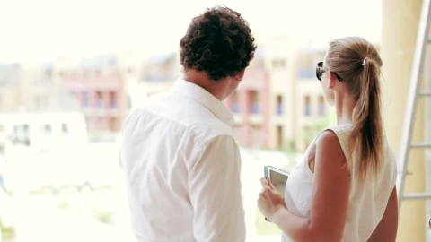 Stock Video Couple Discussing A Construction Project Live Wallpaper For PC - Free Live Wallpaper