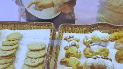 Stock Video Couple Choosing Cookies At Counter Live Wallpaper For PC - Free Live Wallpaper