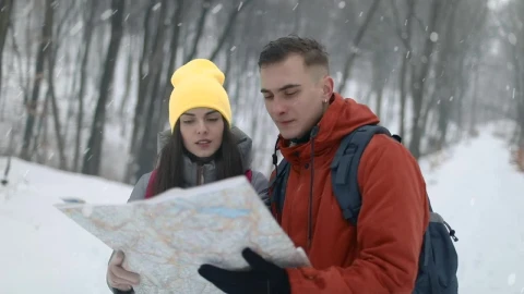 Stock Video Couple Checking Map On Hike In Snowfall Live Wallpaper For PC - Free Live Wallpaper