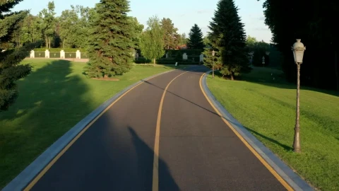 Stock Video Couple Casting Long Shadows As They Ride Bikes Live Wallpaper For PC - Free Live Wallpaper
