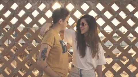 Stock Video Couple Caressing In Front Of Fence Live Wallpaper For PC - Free Live Wallpaper
