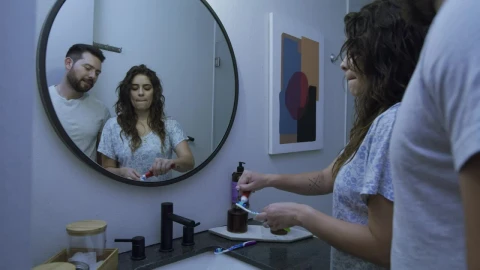Stock Video Couple Brushing Their Teeth Together In A Bathroom Live Wallpaper For PC - Free Live Wallpaper