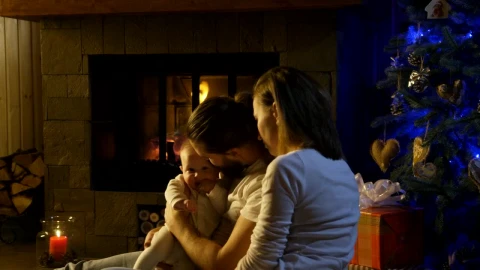 Stock Video Couple And Baby Near The Fireplace Live Wallpaper For PC - Free Live Wallpaper
