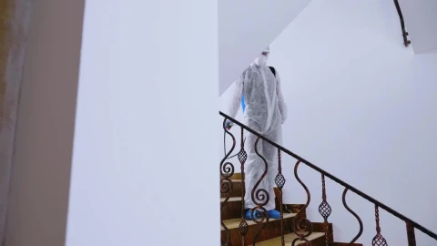 Stock Video Coronavirus Sanitization Of Hand Rail In Hazmat Suit Live Wallpaper For PC - Free Live Wallpaper