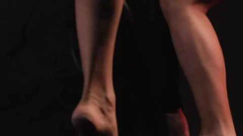 Stock Video Contemporary Dancers In A Dark Spot Knee Level Shot Live Wallpaper For PC - Free Live Wallpaper
