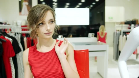 Stock Video Confident Woman Walks Through A Clothing Store Live Wallpaper For PC - Free Live Wallpaper