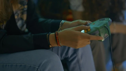Stock Video Concentrated Girl Playing Video Games With Her Friends Live Wallpaper For PC - Free Live Wallpaper