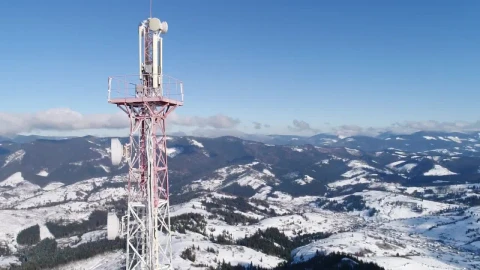 Stock Video Communications Tower In The Snowy Mountains Spinning Aerial Shot Live Wallpaper For PC - Free Live Wallpaper