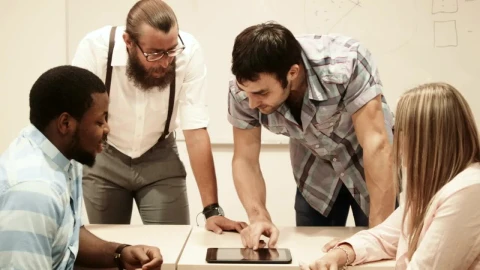 Stock Video College Team Checking Information On A Tablet Live Wallpaper For PC - Free Live Wallpaper