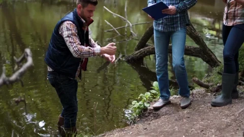 Stock Video Collecting Samples From Polluted Lake Live Wallpaper For PC - Free Live Wallpaper