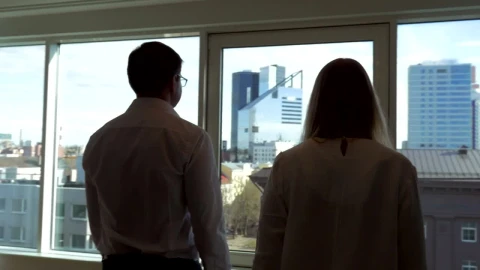 Stock Video Colleagues Looking Out Of A Window Live Wallpaper For PC - Free Live Wallpaper