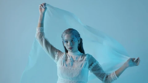 Stock Video Cold And Pale Looking Woman On A Blue Background Live Wallpaper For PC - Free Live Wallpaper