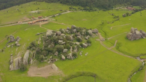 Stock Video Cluster Of Rocks In The Center Of A Huge Meadow Live Wallpaper For PC - Free Live Wallpaper