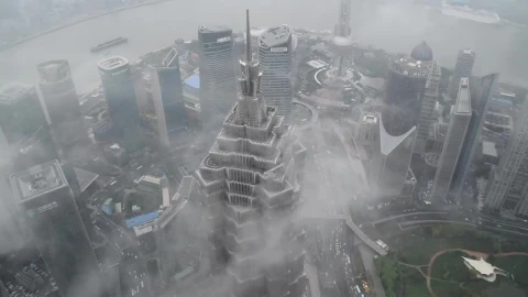 Stock Video Clouds Passing By A Skyscraper In Shanghai Live Wallpaper For PC - Free Live Wallpaper